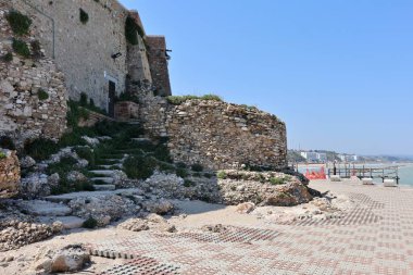 Termoli, Molise, Italy  12 April 2024: Fortified village on the Adriatic sea dominated by the Swabian Castle built in the 11th century clipart
