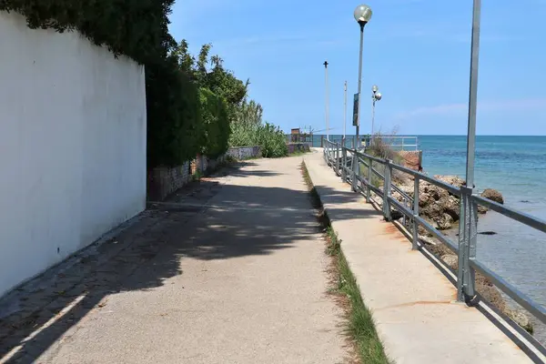 stock image Vasto, Abruzzo, Italy - May 29, 2024: Stretch of the Costa dei Trabocchi between Lungomare Cordella and Trabocco Cungarelle facing the Submerged Archaeological Park of the Roman port of Histonium