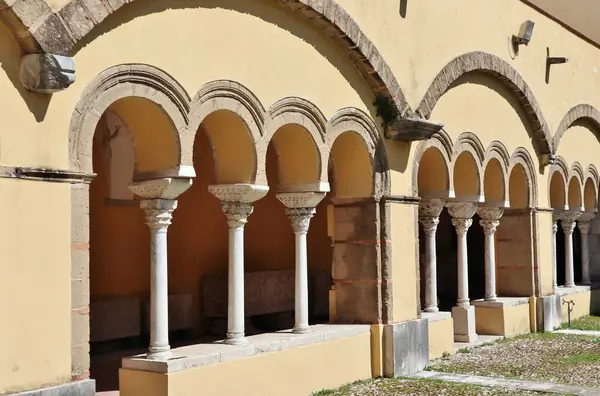 stock image Benevento, Campania, Italy  March 25, 2023: 12th century Romanesque cloister annexed to the Lombard church of Santa Sofia, a UNESCO heritage site, which houses the archaeological section of the Museo del Sannio