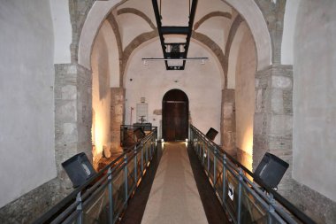 Benevento, Campania, Italy - March 26, 2023: Interior of the Church of SantIlario built by the Lombards in the 7th century on pre-existing Roman structures. After the restoration in 2003 it houses a video museum of the Arch of Trajan clipart