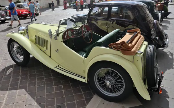 stock image Benevento, Campania, Italy  June 23, 2024: Vintage cars at Corso Garibaldi on the occasion of the thirteenth edition of Streghe al Volante, the national A.S.I. event valid for the Marco Polo Trophy