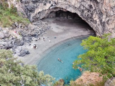 San Nicola Arcella, Cosenza, Calabria, Italy  September 23, 2023: Panoramic view from the path leading to the Arcomagno beach clipart