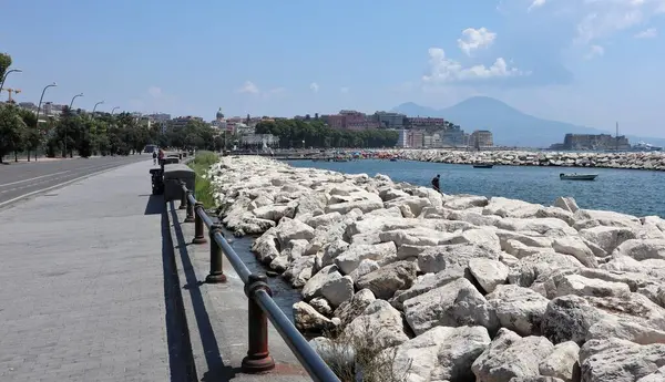 stock image Naples, Campania, Italy  August 6, 2024: Free beach of Lido Mappatella of Rotonda Diaz on Lungomare Caracciolo