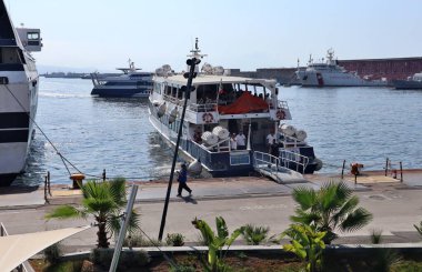 Naples, Campania, Italy  August 6, 2024: Panoramic view of the port from the terrace of the new maritime station of Molo Beverello in Via Acton clipart