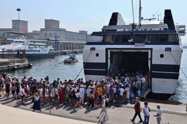 Naples, Campania, Italy  August 6, 2024: Panoramic view of the port from the terrace of the new maritime station of Molo Beverello in Via Acton clipart