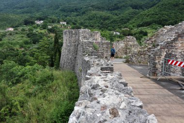 Laviano, Campania, Italy  June 24, 2023: Norman Castle dating back to the 10th century that dominates the village from the top of the Rupe dellOlivella clipart