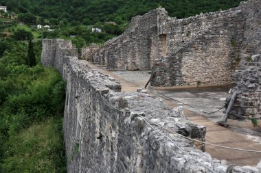 Laviano, Campania, Italy  June 24, 2023: Norman Castle dating back to the 10th century that dominates the village from the top of the Rupe dellOlivella clipart