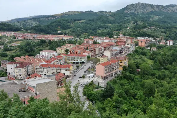 stock image Laviano, Campania, Italy  June 24, 2023: The new village built after the 1980 earthquake from the castle cliff