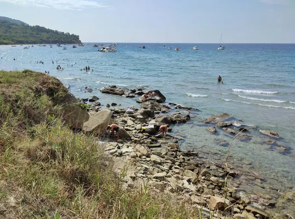 stock image Agropoli, Salerno, Campania, Italy  August 31, 2024: Tourists on the beach of Trentova Bay