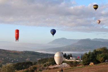 Fragneto Monforte, Campania, Italy  October 12, 2024: Hot air balloons at the Fragneto Monforte sports field for the thirty-sixth international festival clipart