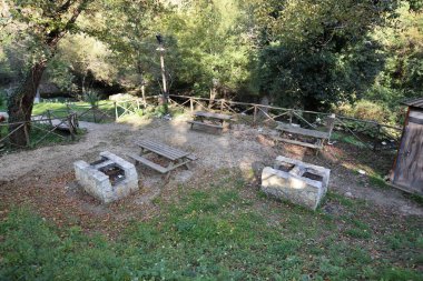 Carpinone, Molise, Italy  November 6, 2024: Nature trail that from the Waterfall Park, in Via Fiume, reaches the Carpino Waterfall or Cascata Grande, formed by the waters of the Carpino and Tura rivers, on the slopes of the village of Carpinone clipart