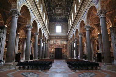 Naples, Campania, Italy  November 12, 2024: Interior of the 17th century Church of the Girolamini or San Filippo Neri along Via dei Tribunali clipart