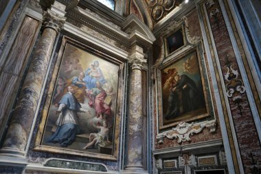 Naples, Campania, Italy  November 12, 2024: Interior of the 17th century Church of the Girolamini or San Filippo Neri along Via dei Tribunali clipart