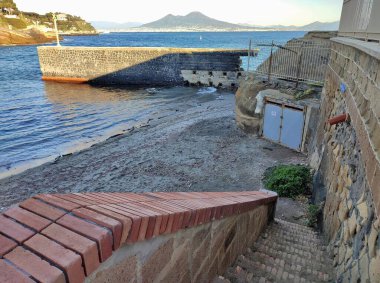 Naples, Campania, Italy  November 23, 2024: Free beach of Posillipo in the Marine Protected Area of the Underwater Park of Gaiola clipart