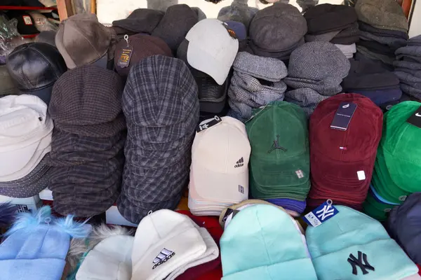 Adana Turkey - 23.01.2025 çeşitli şapkalar tezgahta satılıyor    