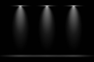 Üç dikey spot ışığıyla siyah arkaplan