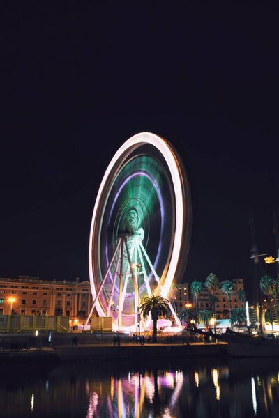 Ferris wheel in motion in the port of Barcelona, Spain, on December 22, 2023