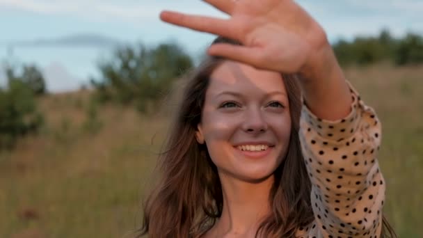 Young Woman Admires Sunlight Sunset Covers Herself Her Hand — Stock videók