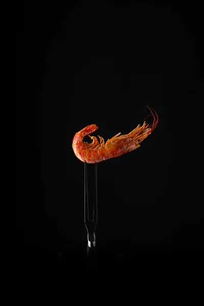 King tiger shrimp on fork. High quality photo