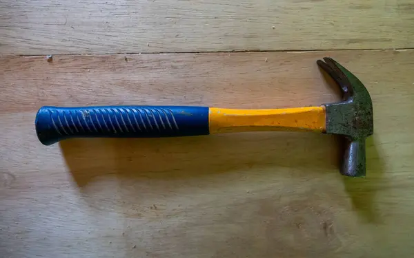 Steel hammer tool with rubber handle