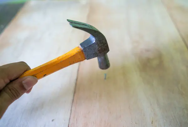 Steel hammer tool with rubber handle