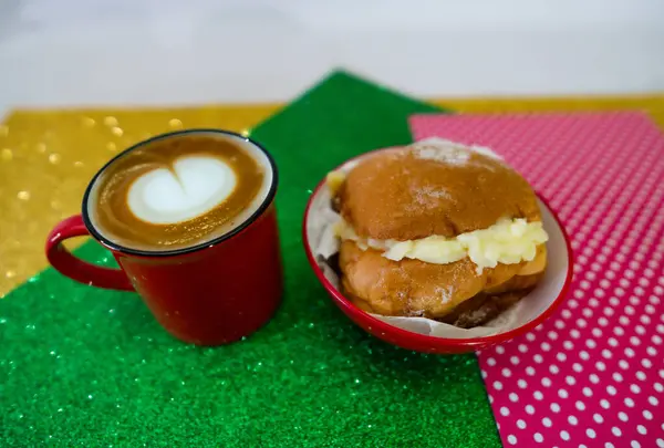 stock image Brazilian traditional sweet dream made from bread with yellow cream