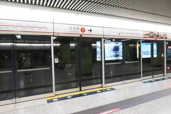 stock image Jordan, Hong Kong- 24 August 2024: Mass Transit railway train MTR platform with train almost arrive for Tsuen Wan Line ( Red Line)