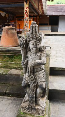Pura Tirta Empul,Tampaksiring, Ubud, Bali, Indonesia- 19 Aug 2025: Hindu spiritual god statue guardian in the temple 