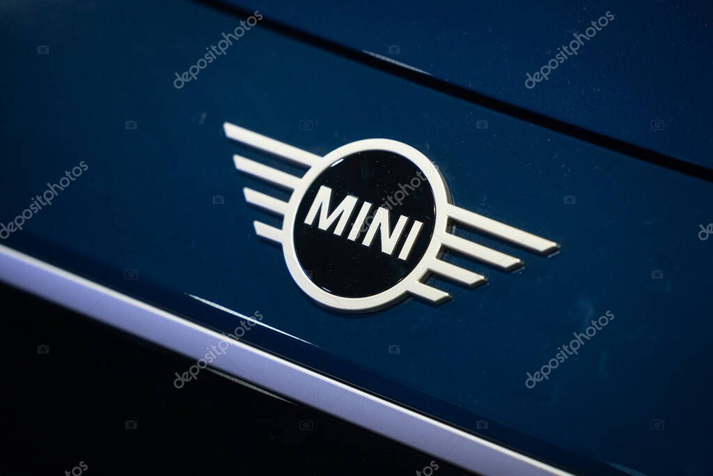 Mini Badge Close-up - Detailed Mini Car Emblem for Automotive Editorial Content