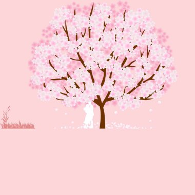 Arka planda bir şelale, çiçekler ve kuşlar var..