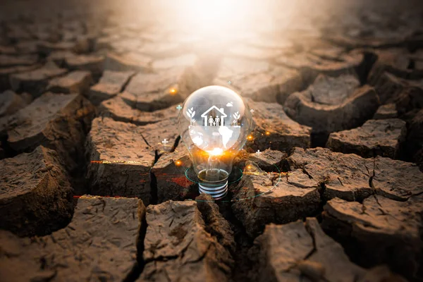 Light bulb with world and people icon protecting environment from water crisis and the impact of climate change, social responsibility and save water, drought disaster and water demand , ESG concept.