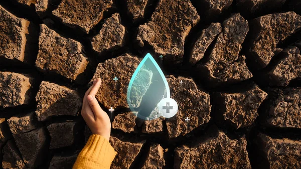 Woman hand with water droplets icon protecting environment from water crisis and the impact of climate change, social responsibility and save water, drought disaster relief and water demand concept.