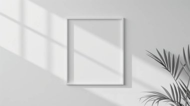 A blank picture frame on a white wall, illuminated by natural sunlight streaming through a nearby window. clipart