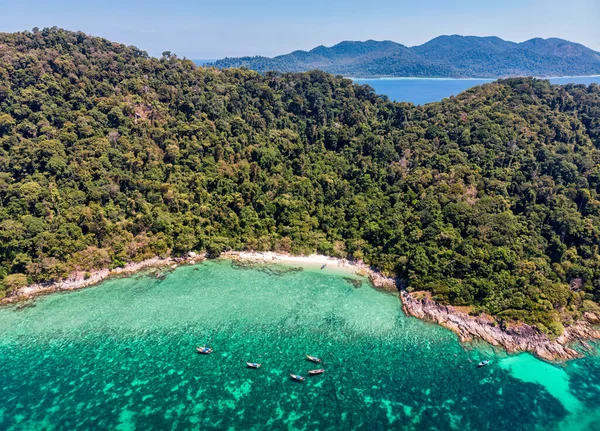 stock image Aerial view of beautiful Koh lipe island with tropical sea, fishing boat and resort on the beach in summer vacation at Satun, Thailand