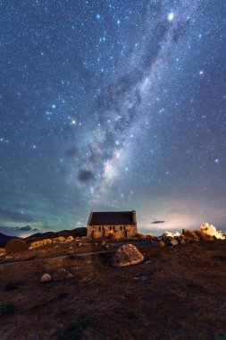 Fantastic nightscape of Milky Way, Nebula, Aurora Australis glowing over Church of the Good Shepherd at Lake Tekapo, New Zealand