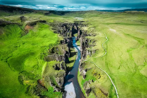 stock image Aerial view landscape of Fjadrargljufur rugged canyon naturally eroded with Fjadra river flowing in summer at Kirkjubaejarklaustur, Iceland