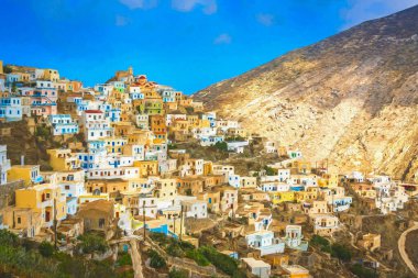 Hillside colorful homes in the old tradition village Olympos in Karpathos island, Dodecanese Greece