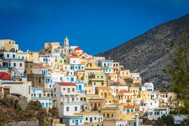 Hillside colorful homes in the old tradition village Olympos in Karpathos island, Dodecanese Greece