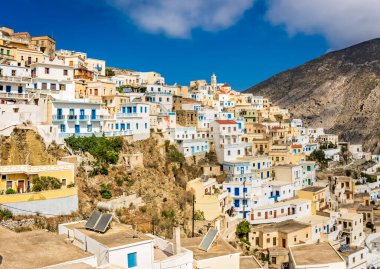 Hillside colorful homes in the old tradition village Olympos in Karpathos island, Dodecanese Greece
