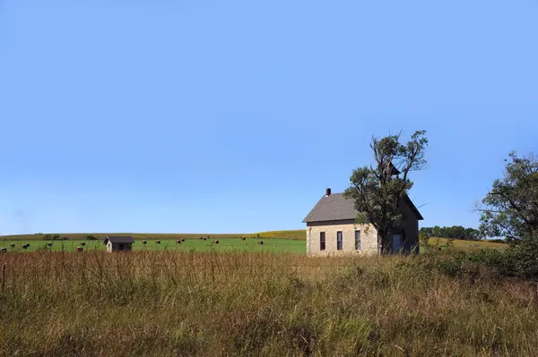 stock image Bichet School house, Marion County, Kansas, has a bell tower and is of limestone construction.  The building is dated 1896.