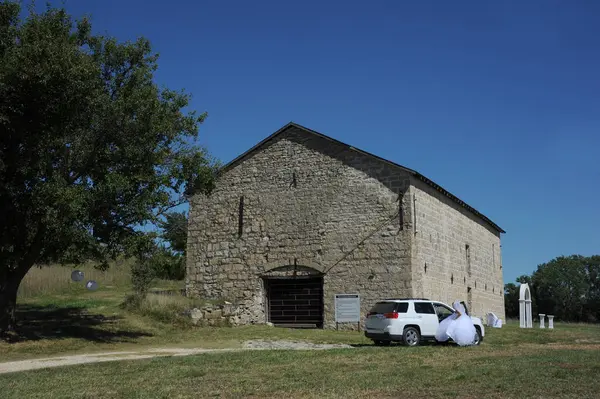 stock image Limestone Bank Barn, Council Grove, Kansas, is a restored landmark on the National Register of Historic Places.  It is now also used as a wedding venue.