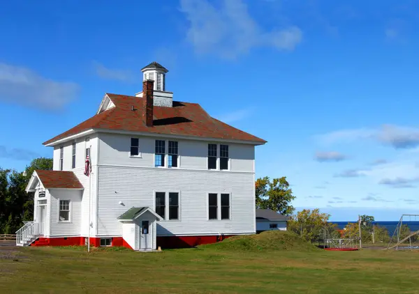 stock image Historic Eagle River School House has been converted into a community center and museum.  Museum is located in Eagle River, Michigan.