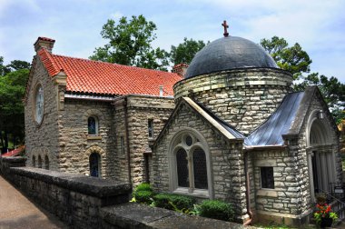 St. Elizabeth's Catholic Church in Eureka Springs, Arkansas is a historical landmark. clipart