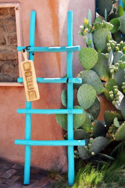 Colorful turquoise, wooden ladder catches the eye of visitors to 