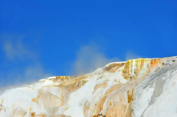 Stock image Mounds formed by the geothermal activity of Mammoth Springs in Yellowstone National Park.  View shown is of Upper Terrace.