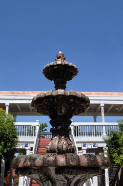 Old Town in Albuquerque still has a Spanish-western feel.  This fountain is a landmark on the plaza. clipart