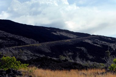 Volkanlar Ulusal Parkı 'ndaki Hawaii' nin Büyük Adası 'ndaki Kilauea Volkanı' ndan bir lav dağı yükselir..