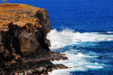 On the Big Island of Hawaii, the Alenuihaha Channel, the winds and waves ravage the cliffs which continue to erode. clipart