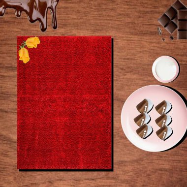 Çikolata Küpleri: Pembe tabakta ev yapımı lezzetli kare çikolatalar, kasede beyaz eritilmiş çikolata, masada siyah eritilmiş çikolata ve 2 çikolata..