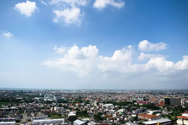 stock image High angle aerial Settlement semarang Indonesia with cloudy blue sky background